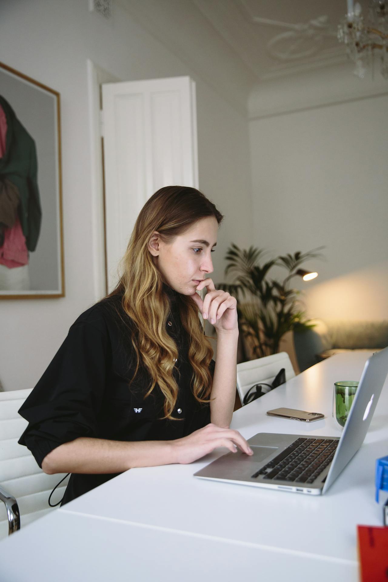 a student looking at the computer : National Trade Institute WIOA Programs​